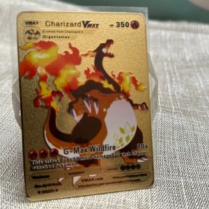 Rare Pokémon Gold/Metal Foil Card Charizard VMAX 143/293
